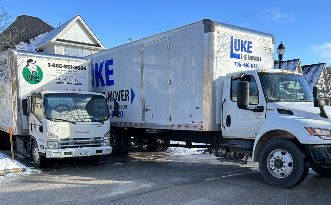 Two moving trucks ready for quick residential and commercial moves.